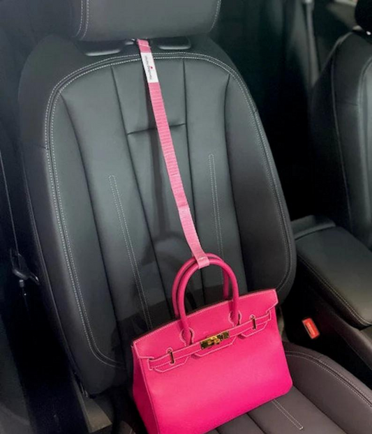 A purse on the floor, is money out the door! a Strap For That™ Limited Edition Pink patent-pending Handbag Halter